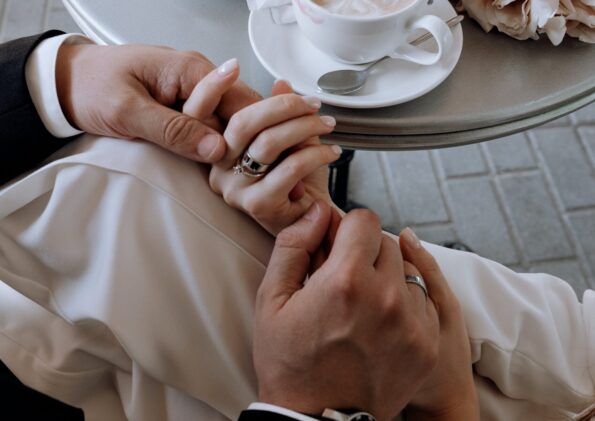 man holding woman hand